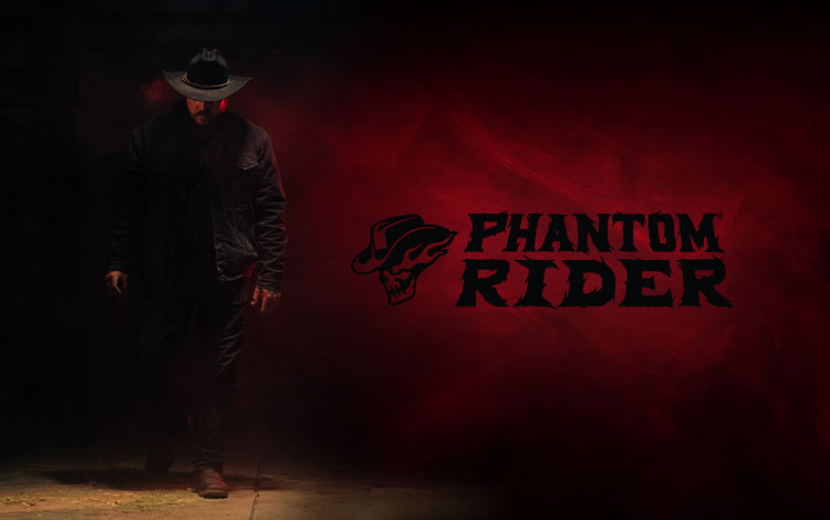 Cowboy standing in the dark with red smoke. Phantom Rider logo.